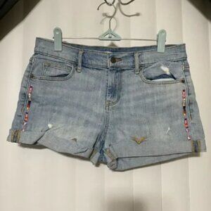 Old Navy boyfriend denim blue shorts with embroidery on the side.